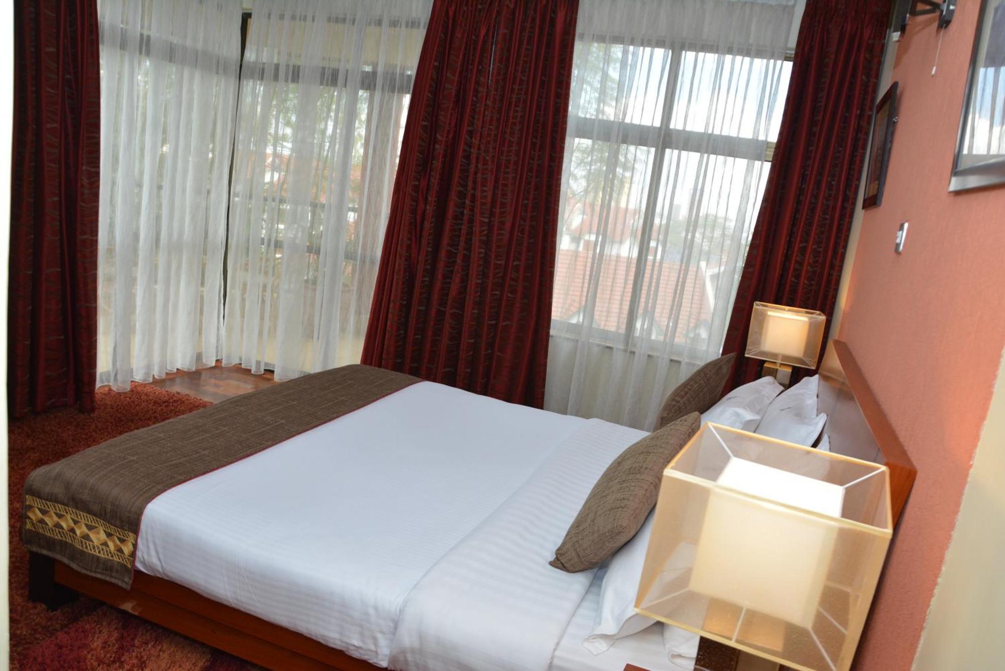 Gemsuites Serviced Apartments State House Найроби Номер фото